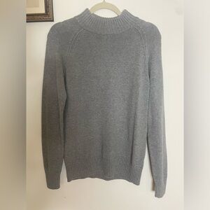 Grey semi turtle neck sweater. Size M and in perfect condition.